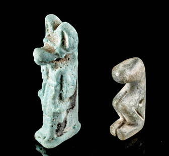 Lot of 2 Egyptian Stone & Faience Amulets: Egypt, Late Dynastic Period, 26th to 31st Dynasty, ca. 664 to 332 BCE. A lovely pair of amulets from ancient Egypt. First is a crouching zoomorphic creature of an abstract presentation that is carved