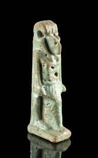 Fine Egyptian Faience Amulet of Bastet: Egypt, Late Dynastic Period, 26th to 31st Dynasty, ca. 664 to 332 BCE. An excellent mold-formed faience amulet of a striding Egyptian god or goddess, possibly Bastet, wearing a skirt with its left