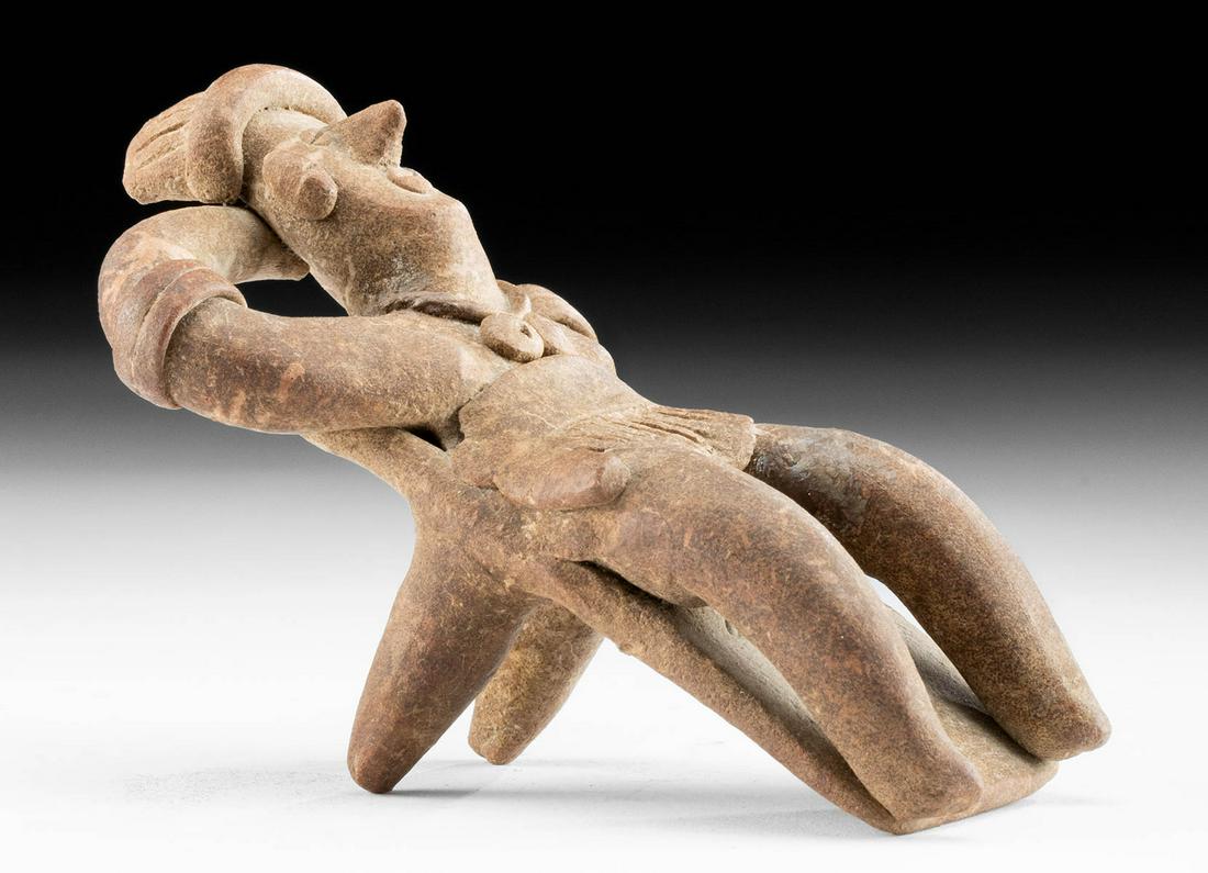 Jalisco Pottery Reclining Figure: **Originally Listed At $125** Pre-Columbian, West Mexico, Jalisco, ca. 300 BCE to 300 CE. A hand-built pottery figure shown relaxing in a slanted position atop a bipedal reclinitario. The figure wears