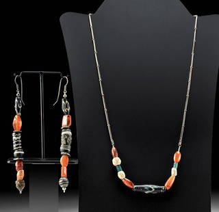 Phoenician Glass & Carnelian Bead Necklace & Earrings: Classical World, Eastern Mediterranean, Phoenician, ca. 1st century BCE to 3rd century CE. A wonderful necklace and earring set comprised of ancient glass and carnelian beads strung with vintage