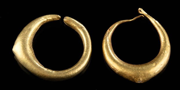 Roman Gold Earrings (pr): Roman, Imperial Period, ca. 1st to 3rd century CE. An elegant matching pair of 85.6 to 88.5% gold earrings (equivalent to 20K+) both of a classical and simple form. A crescent-like hoop, wide in