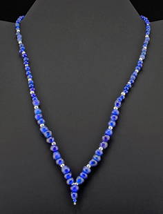 Roman Glass Bead Necklace - Brilliant Cobalt Blue Hues!: Rome, Imperial, ca. 1st to 3rd century CE. An exquisite wearable necklace comprised of dozens of spherical and barrel-shaped glass beads in shades of brilliant cobalt blue strung on a modern necklace