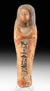 Egyptian Terracotta Ushabti - Hieroglyphs: Egypt, Third Intermediate Period to Late Dynastic Period, ca. 1070 to 332 BCE. A painted terracotta ushabti (shabti) with a finely painted line of hieroglyphs - probably a prayer to Osiris - down its