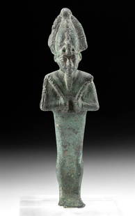Egyptian Bronze Standing Figure of Osirus: Egypt, Late Dynastic Period, 26th to 31st Dynasty, ca. 664 to 332 BCE. A cast-bronze figure of Osiris, the god of the underworld and one of the most instantly recognizable deities in the Egyptian