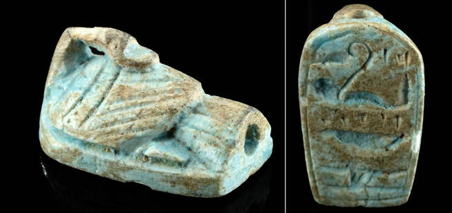 Egyptian Faience Goose Amulet w/ Hieroglyphs: Egypt, Ptolemaic Period, ca. 332 to 30 BCE. A remarkable mold-formed faience goose amulet with a backwards turned neck and the head resting on the incised wings. The amulet is perforated through the