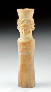 Romano-Egyptian Coptic Bone Idol of a Female: Egypt, Roman period to Coptic culture, ca. 2nd century CE. A delightful female idol carved from a hollowed-out bone, probably from livestock or a small wild ungulate. The female bust form is rendered