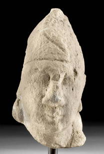 Cypriot Limestone Head of Beardless Male w/ Cap: Ancient Cyprus, Archaic Period, 8th to 6th century BCE. Cypriot sculptures like this are getting more difficult to find and are very desirable! A sensitively carved limestone head of a male, wearing