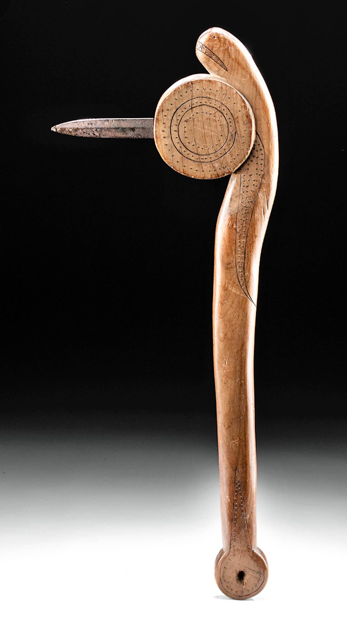 Late 19th C. Eastern Plains Indians Gunstock Dance Club: Native American, Central Plains, Eastern Plains Indians, ca. late 19th to early 20th century CE. A sizable dance club that is hand-carved from nicely grained wood used to make light but durable rifle 