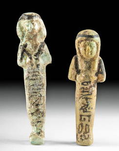 Egyptian Third Intermediate Faience Ushabtis (2): Ancient Egypt, Third Intermediate Period, Dynasties 21 to 25, ca. 1070 to 664 BCE. An impressive pair of mold-formed faience ushabtis, both presenting upright in a mummiform position: feet jutting