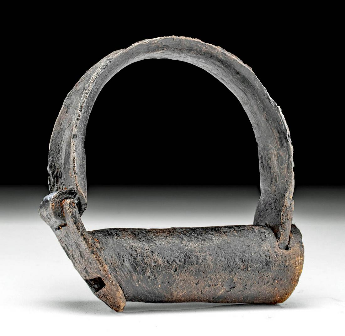 18th C. American Iron Shackle Cuff: North America, United States, ca. 18th to 19th century CE. An iron cuff for a wrist or ankle shackle which was probably used for prisoners or enslaved persons. The shackle is comprised of a u-shaped b