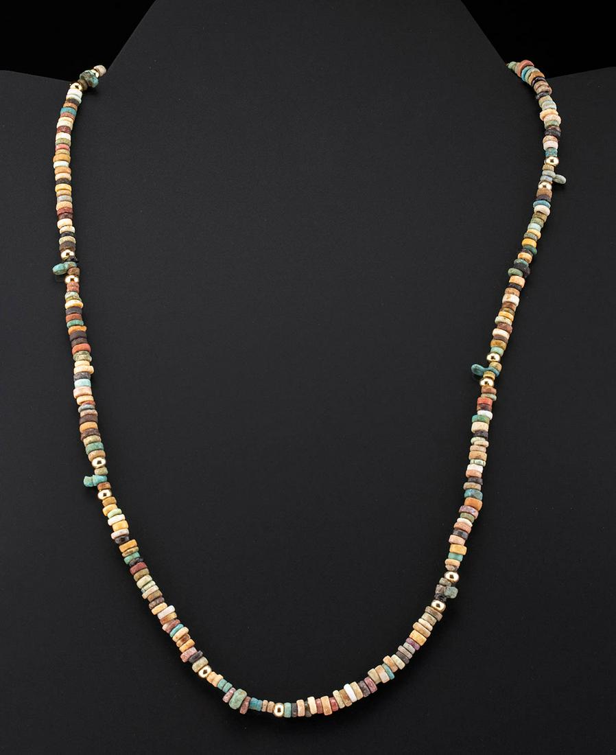 Lovely Egyptian Faience Bead Necklace: **First Time At Auction** Ancient Egypt, Third Intermediate to Late Dynastic Period, 21st to 31st Dynasty, ca. 1070 to 332 BCE. A lovely and wearable necklace comprised of over a hundred ancient faien