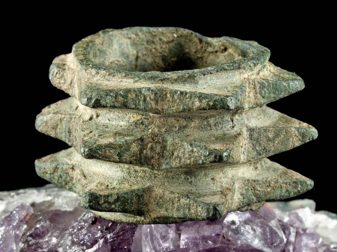 Etruscan Leaded Bronze Mace Head Ring: **First Time At Auction** Classical World, Southern Europe, Etruria, Etruscan culture, ca. 5th to 3rd century BCE. A masculine ring forged from leaded bronze that was perhaps once part of a longer, tu