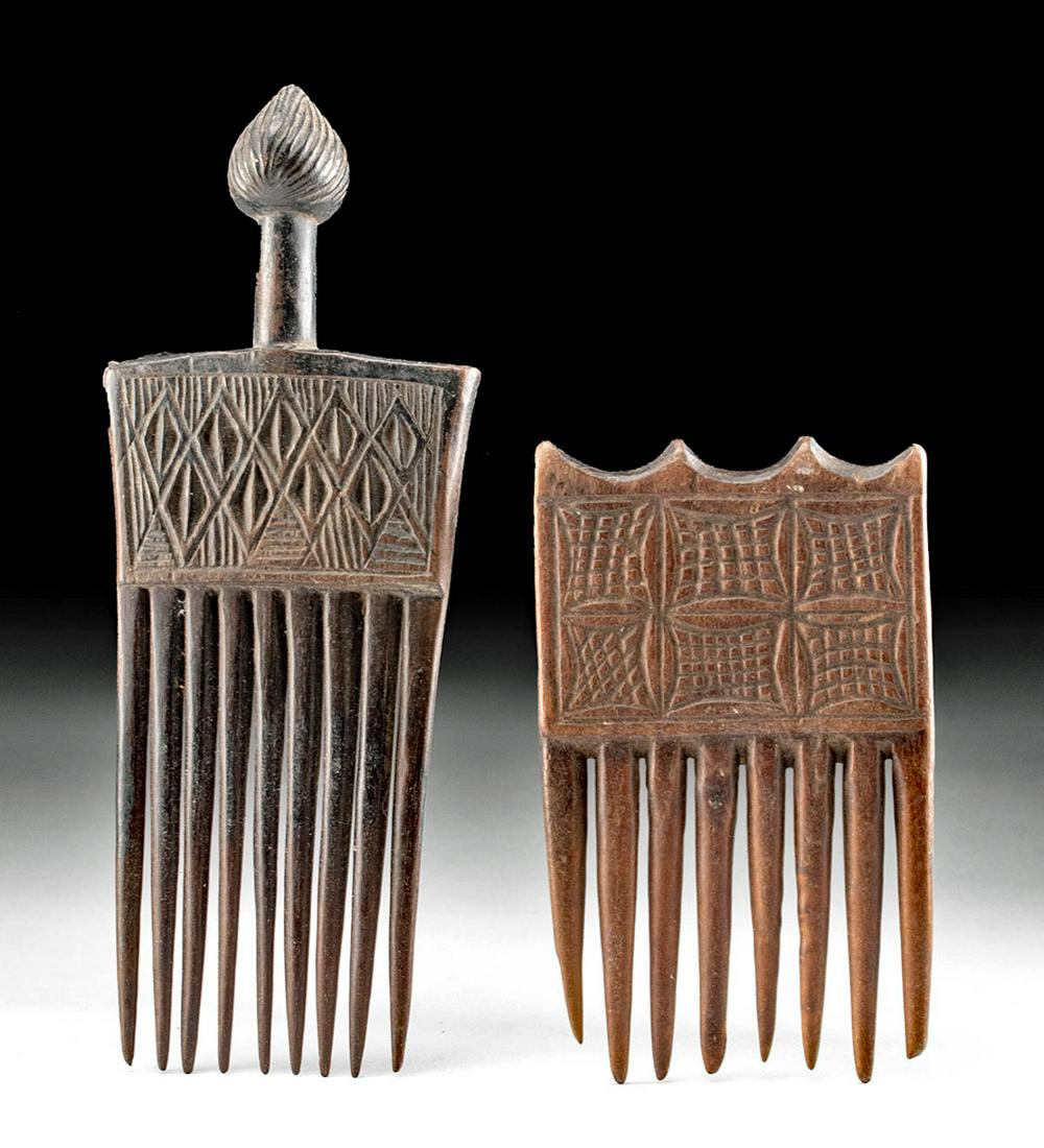 Two 20th C. African Chokwe Wood Combs: Central Africa, Angola, Zambia, and Democratic Republic of the Congo, Chokwe peoples, ca. 20th century CE. A lovely pair of carved-wood hair combs, or cisakulo, both presenting in rectangular form wit