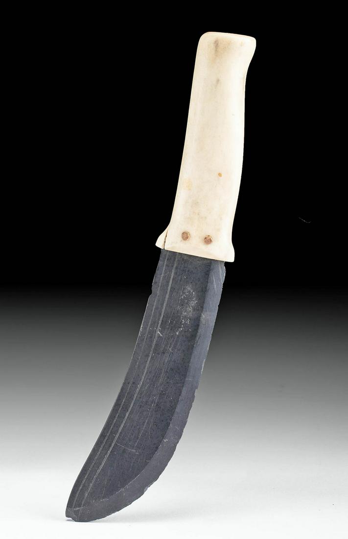 20th C. Inuit Slate Knife w/ Antler Handle: Arctic World, Inuit people, ca. early to mid 20th century. A fascinating utility knife comprised of a finely carved antler (possibly Caribou) handle and a slate blade that is elegantly curved, incised