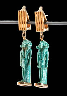 Egyptian Faience Khnum Pendants / Gold Earrings: Egypt, Late Dynastic Period, 26th to 31st Dynasty, ca. 664 to 332 BCE. A gorgeous, unique, and wearable set of earrings displaying matching molded faience pendants that depict Khnum, the ram-headed