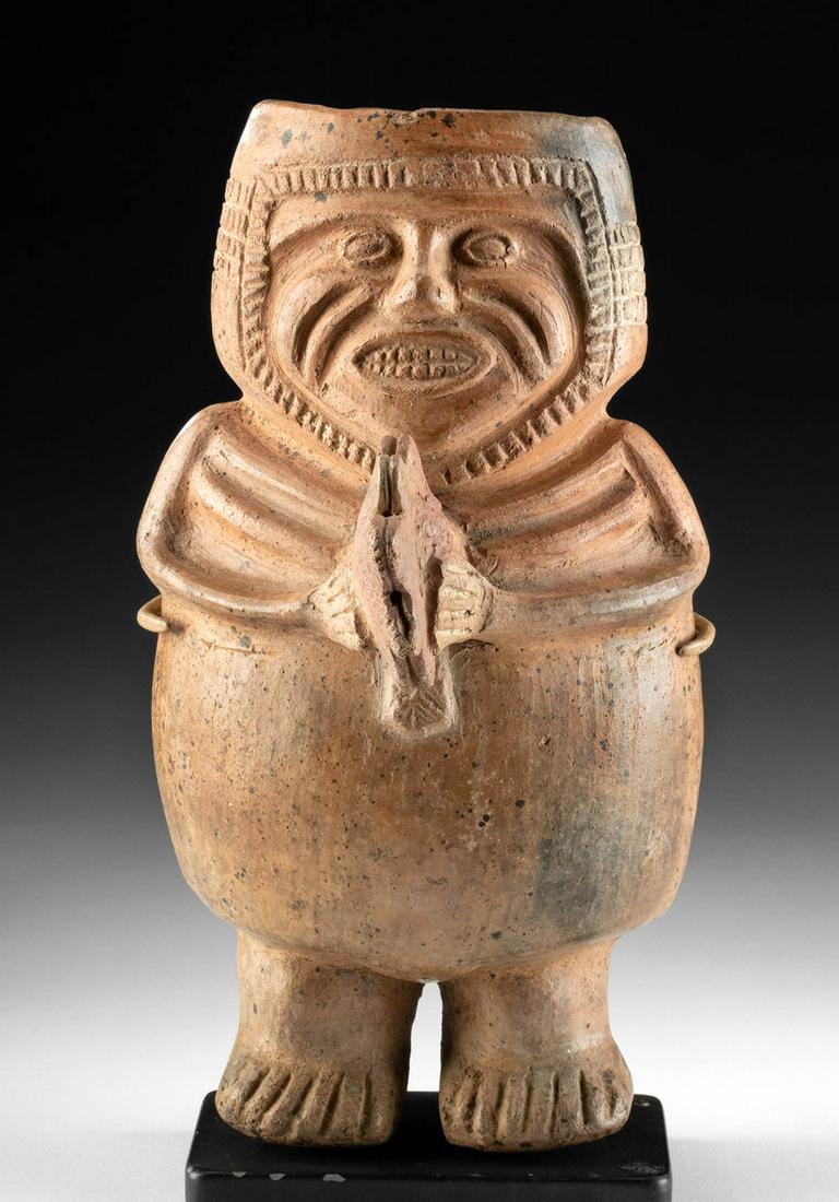Inca Redware Figural Vessel - Ayahuasca Taker: Pre-Columbian, Northern Peru, Inca Empire, ca. 1200 to 1500 CE. A rare mold-formed hollow pottery figure under the influence of Ayahuasca, his teeth exposed, his cheeks in a grimace, and his coffee-be