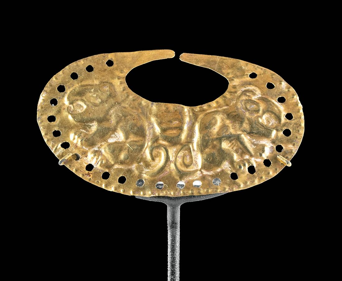 Moche Gold Nose Ring with Jaguars - 1.6 G: Pre-Columbian, Peru (North Coast), Moche Culture, ca. 100 to 700 CE. A stunning 62% gold (equivalent to greater than 14 karat) nose ring in a flat, ovoid form with a round aperture at its top for susp