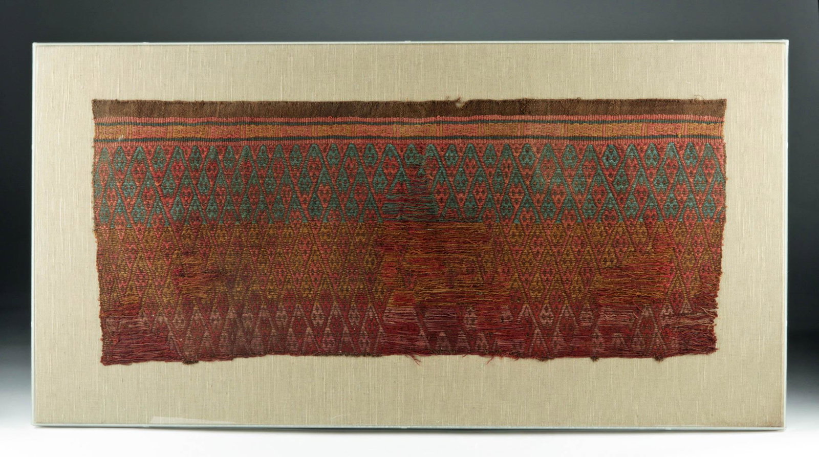 Very Large Chimu Textile Mounted Under Plexiglass: **Originally Listed At $150** Pre-Columbian, North Coast Peru, Chimu, ca. 1000 CE. A very large Chimu textile comprised of finely woven camelid fibers, presenting a gorgeous pattern of diagonal bands
