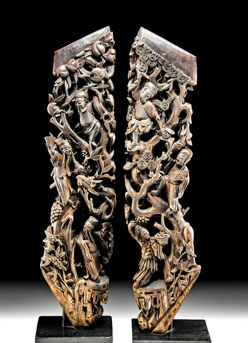 Pair of Antique Chinese Qing Wood Corbels w/ Openwork: East Asia, China, Qing Dynasty, ca. 19th century CE. An impressive pair! Two tall rosewood corbels, ornately carved with openwork featuring mirrored motifs of scrolling foliate, bamboo, and grapevines