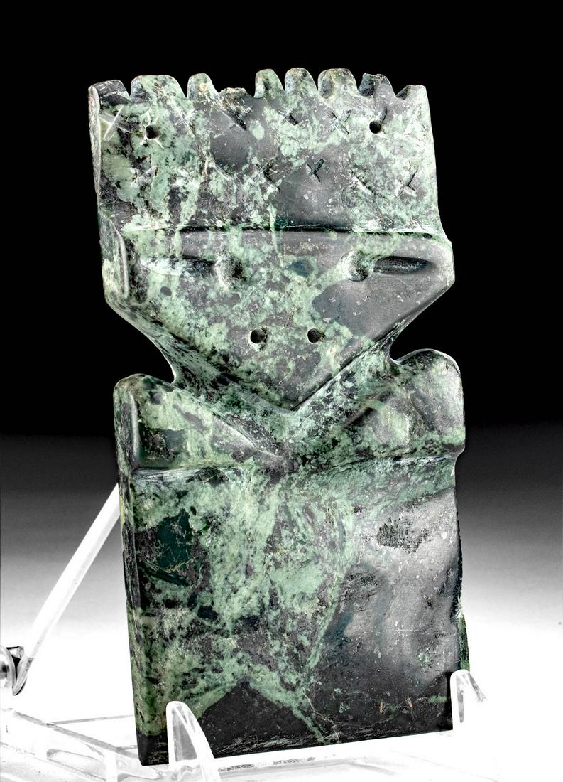 Costa Rican Jade w/ Greenstone Inclusions Avian Pendant: Pre-Columbian, Central America, Costa Rica, Guanacaste / Nicoya region, ca. 200 to 600 CE. An endearing celt, hand-carved from jade (nephrite) with greenstone inclusions. The piece presents an abstrac
