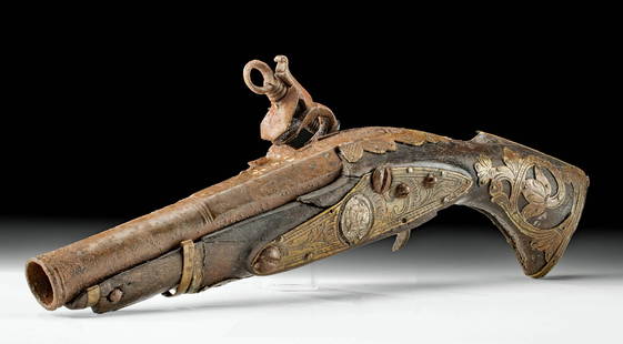 18th C. Spanish Colonial Flintlock Pistol w/ Silver: North America, Mexico / Southwestern United States, Spanish Colonial period, ca. late 18th to early 19th century CE. A handsome flintlock pistol featuring a wooden stock, steel barrel, and silver and