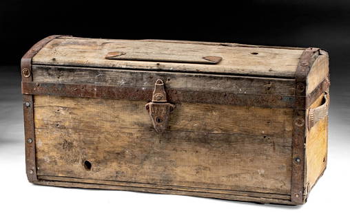 19th C. American Wood & Iron Storage Chest w/ Wheels: North America, United States, ca. 1869 to early 1900s CE. A wooden and metal storage chest with wheels! This rustic piece is constructed from planks of wood with iron brackets. Both ends feature