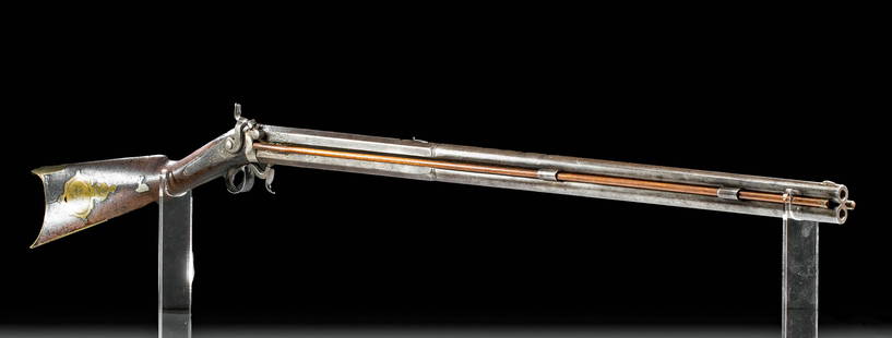 19th C. American Steel, Brass & Wood Rifle - R. Ashmore: North America, United States, ca. 19th century CE. This is truly a handsome gun! A double barrel muzzle loading rifle made by R. Ashmore and Sons with wood, steel, brass, and nickel-brass components.