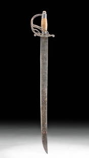 18th C. Spanish Colonial Iron & Wood Broadsword: North America, Mexico / Southwestern USA, Spanish Colonial period, ca. 18th to 19th century CE. An intimidating saber, known as an espada ancho or broad sword, which was carried by Spanish soldiers.