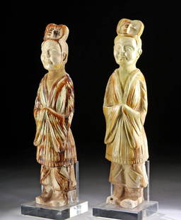 Chinese Tang Pottery Attendant Figures, TL Tested: East Asia, China, Tang Dynasty, ca. 618 to 907 CE. A pair of wonderfully preserved mold made attendant figures, each covered in thick, colorful, sancai glaze. The nearly identical figures each wear