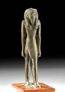 Egyptian Bronze Striding Pharaoh, ex-Parke-Bernet: Ancient Egypt, Late Dynastic Period, 26th to 31st Dynasty, ca. 664 to 332 BCE. A superb, near miniature, cast-leaded bronze pharaoh. The figure presents with his left leg striding forward atop an