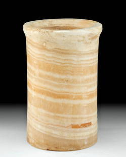 Beautiful Egyptian Late Dynastic Banded Alabaster Jar: Egypt, Late Dynastic Period, 26th to 31st Dynasty, ca. 664 to 332 BCE. A beautiful jar of a slender, cylindrical form with a flat base, tall walls, and a thick rim surrounding the deep basin. The