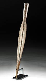 Ancient Celtic Iron Socketed Spear Head: Ancient Central / Northern Europe, Celtic Iron Age, ca. 5th to 1st century BCE. An iron spear head with a large blade and socket. The blade it petaloid, with a pointed tip and prominent midrib that ru