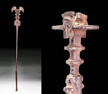 Luristan Iron Sword w/ Crouching Lions, ex-Guttman: Ancient Near East, northwestern Iran, Luristan, ca. 1100 to 600 BCE. A striking iron sword presenting a flat, petaloid blade with a thick, raised fuller and topped by an elaborate hilt comprised of a