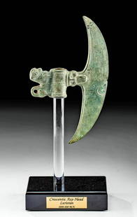 Luristan Speculum ( White Bronze) Crescent Axe Head: Ancient Near East, Northwestern Iran, Luristan, ca. 1000 to 800 BCE. A gorgeous cast-white bronze (a tin rich bronze also known as speculum) axe head of a slender, crescent form. The fine implement di