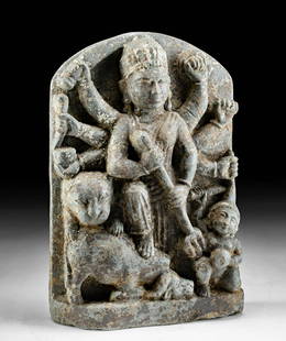 14th C. Nepalese Stone Relief - Hindu Goddess Durga: Central Asia, modern day Nepal, ca. 14th to 15th century. An impressive hand-carved stone relief of the Hindu goddess Durga. With her lion vahana (sacred mount) peaking out from behind her, the