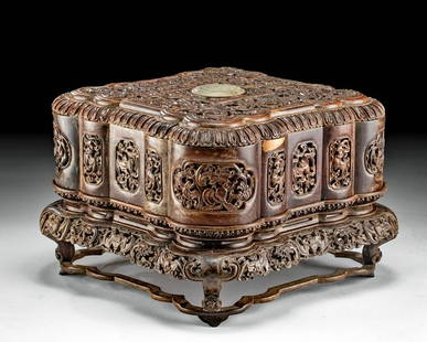 19th C. Chinese Qing Zitan Wood Box w/ Jade Inlays: East Asia, China, Qing Dynasty, ca. 19th century CE. A hand carved box beautifully crafted from zitan wood, with intricate openwork and a jade inlays. The vessel body is supported on pedestal feet