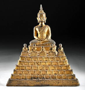 18th C. Thai Gilded Brass Seated Buddha Atop 7 Tiers: Southeast Asia, Thailand, Rattanakosin, ca. 18th century CE. An exquisite gilt brass Buddha seated in half lotus position atop a seven-tiered throne comprised of six rows of his followers with five
