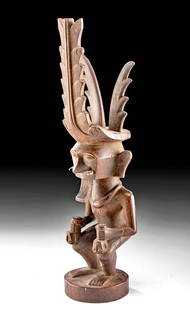 Early 20th C. Sumatran Nias Wood Adu Zatua Figure: Southeast Asia, Indonesia, North Sumatra Province, Nias Islands, ca. early 20th century CE. An impressive hand-carved wooden male ancestral figure known as "Adu Zatua." Exhibiting a rigid form, the