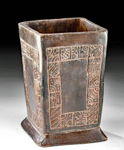 Maya Pottery Cuboid Vessel with Glyphs: Pre-Columbian, Mexico and northern Central America, Maya Territories, Late Classic, ca. 550 to 950 CE. A rare and remarkable pottery vessel of cuboid form presenting an applied, flared foot and thick