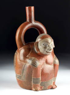 Chavin Tembladera Spouted Vessel Transforming Shaman: Pre-Columbian, North Coast Peru, from Tembladera in the Jequetepeque Valley, ca. 1200 to 500 BCE. A rare tri-colored stirrup vessel depicting a shaman engaged in a trance-like state, most likely