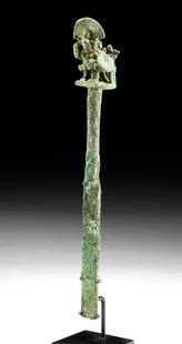 Impressive Moche Copper Tumi w/ Warrior Finial: Pre-Columbian, North Coast Peru, ca. 100 BCE to 100 CE. An impressive Moche tumi, a ceremonial knife that features a copper-silver alloy lord king warrior finial holding a mace in one hand, with an