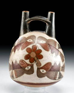 Nazca Polychrome Pottery Stirrup Vessel w/ Hummingbirds: Pre-Columbian, South Coast Peru, Nazca, ca. 200 CE. A beautiful polychrome terracotta vessel of a round-bottomed globular form with a double spouted stirrup handle, the body finely decorated with four