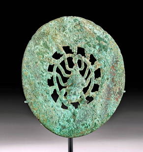Sican Lambayeque Ceremonial Copper Disk: Pre-Columbian, North Coast Peru, Sican / Lambayeque culture, ca. 750 to 1370 CE. A wonderful 99.5% copper ceremonial disk adorned with an openwork oracle spider or scorpion featuring eight slender