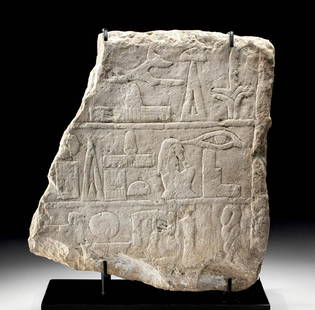 Translated Egyptian Limestone Offering Stele: Ancient Egypt, Old Kingdom, 3rd to 6th Dynasty, ca. 2686 to 2181 BCE. A beautiful fragment of a hand-carved limestone offering stele for a deceased individual. The thick tablet features three