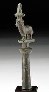 Egyptian Ptolemaic Bronze Staff Finial Ram Atop: Egypt, Ptolemaic Period, ca. 332 to 30 BCE. A wondrous leaded bronze staff finial of a tubular form surmounted by a crowned ram representative of Khnum, the god of the inundation of the Nile River