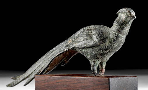 Exhibited 5th C. Byzantine Brass Pheasant, Royal Athena: Near East, Byzantine, ca. 5th century CE. A charming brass pheasant, finely cast via the lost wax (cire perdue) technique, with a pert head and crest, standing upright upon its feet - its wings
