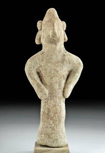 Syro-Hittite Pottery Standing Idol: Ancient Near East, Northern Syria, Syro-Hittite culture, ca. 3000 to 2000 BCE. A hand-built pottery figure with stylized features and traces of tan-hued slip covering the exterior surface. The