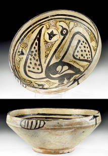 10th C. Nishapur Glazed Pottery Bowl w/ Bird w/ TL: Ancient Near East, Iran, Nishapur, ca. 10th century CE. A beautiful glazed earthenware bowl of a wheel-thrown rounded form on a short foot and handsomely decorated with a large bird on the tondo