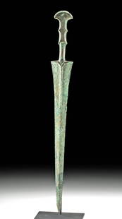 Luristan Bronze Short Sword: Ancient Near East, northwestern Iran, Luristan culture, ca. 1000 to 600 BCE. A beautiful cast-bronze short sword with an openwork handle and pommel meant to house inlaid panels of stone or bone. The