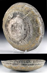 Sassanian Gilded Repousse Silver Bowl Birds & Berries: Ancient Near East / Central Asia, Sasanian (Sassanian / Sassanid) Empire, ca. 6th to 7th century CE. An incredible gilded 93% silver bowl with skillfully hammered, remarkably thin walls finely